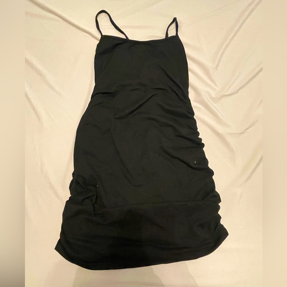 Black mini backless dress.